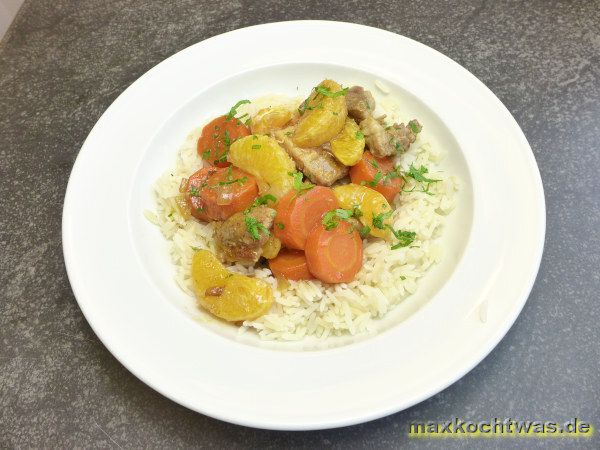 Kokotte mit Schweinefleisch mit Clementinen und Karotten